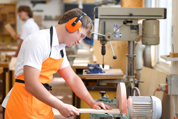 Student using machinary