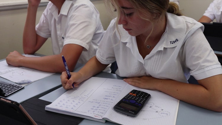 Girl doing math work